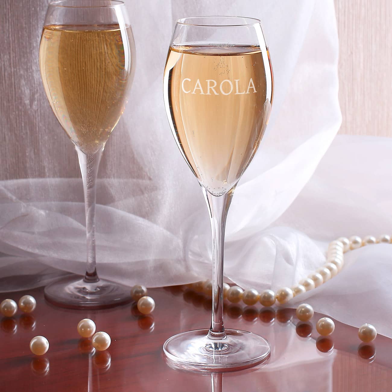 Ihr Wunschname wird auf das Champus-Glas graviert