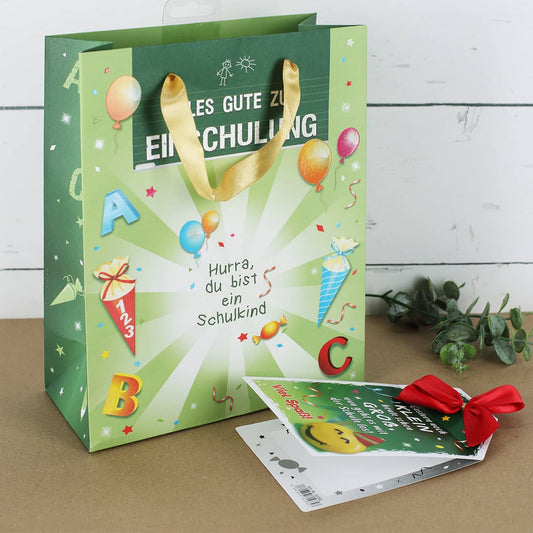 Fröhlich gestaltete Geschenktasche mit Glückwunschkarte