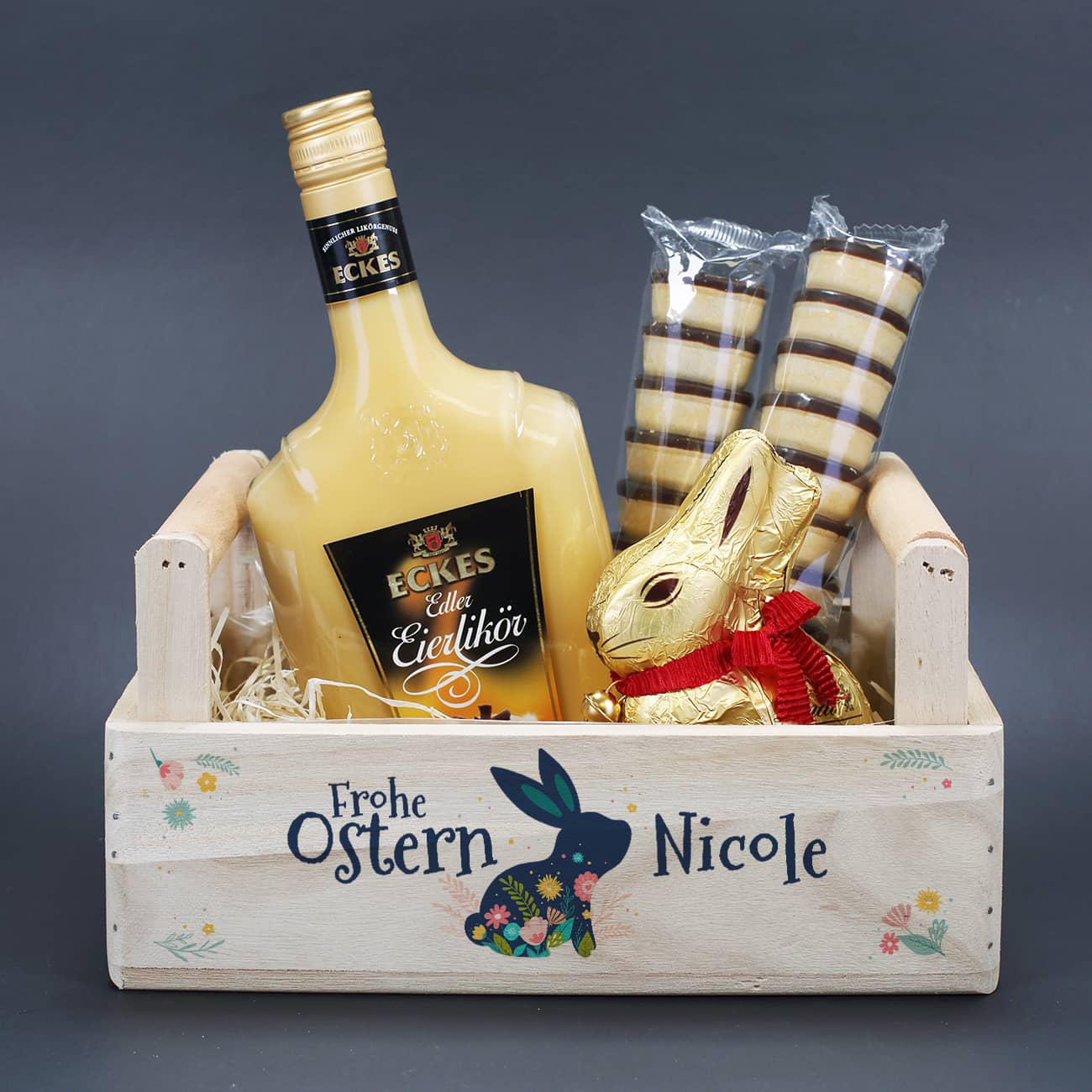 Geschenkset zu Ostern im Holzkorb mit Eckes Eierlikör, Lindt Goldhase ... Geschenkset zu Ostern im Holzkorb mit Eckes Eierlikör, Lindt Goldhase ...