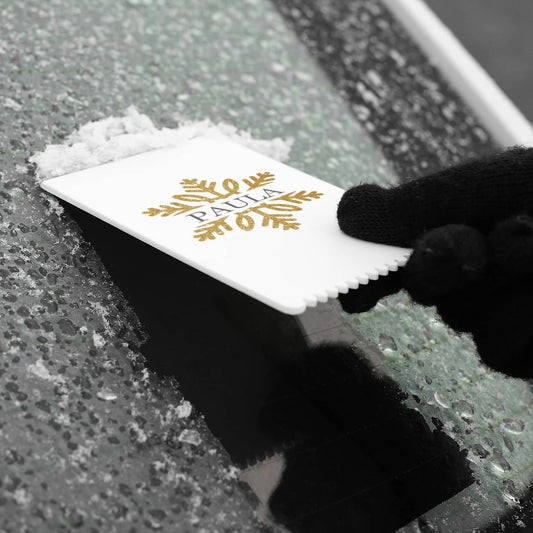 Eiskratzer mit goldenem Schneeflocke und Name