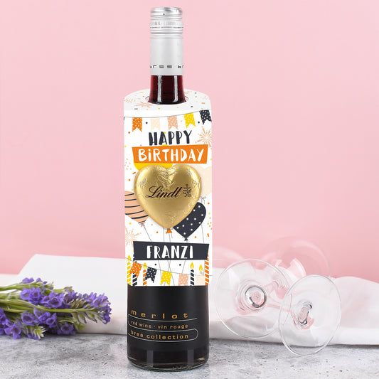 Goldenes Lindt Schokoladenherz auf dem Geburtstagsanhänger – glänzend und mittig angebracht.