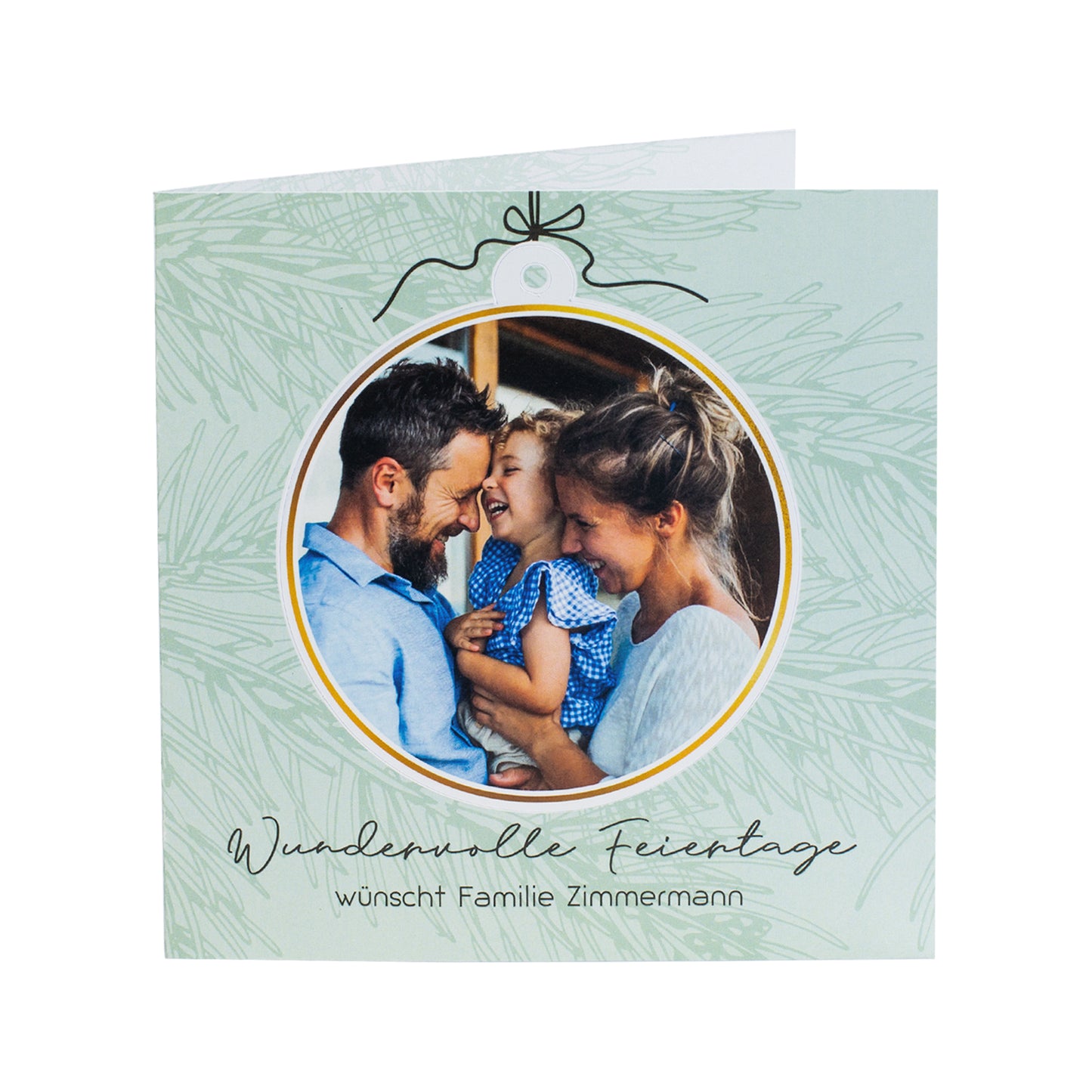 Quadratische Weihnachtskarte mit herausnehmbarer Fotokugel, freigestellt auf weißem Hintergrund