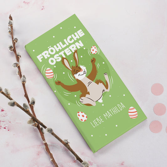 Schokolade zu Ostern mit Wunschtext und fröhlichem Osterhasenmotiv
