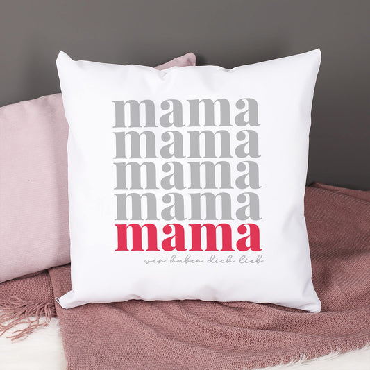 Personalisiertes Mama Kissen als Muttertagsgeschenk auf Sofa mit rosa Decke
