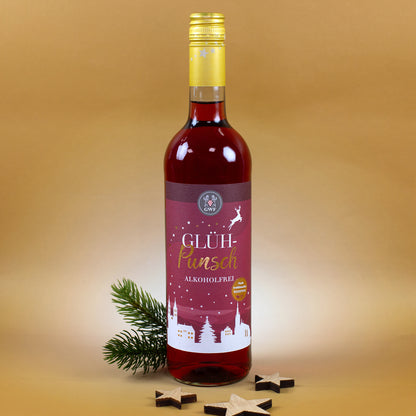 Flasche alkoholfreier Glühpunsch Rot mit winterlichem Etikett, Tannenzweig und Holzsternen