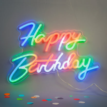 Happy Birthday Schild mit mehrfarbiger RGB LED Beleuchtung an der Wand