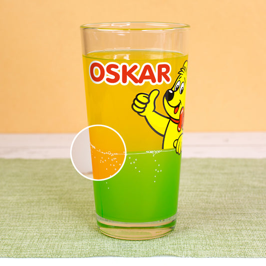 HARIBO Trinkglas mit Orange-Grün-Design und markiertem Farbübergang im unteren Bereich, Name Oskar.