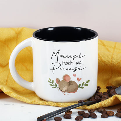 Weiße Keramiktasse mit schwarzer Innenseite und Mausi mach mal Pausi Maus Motiv