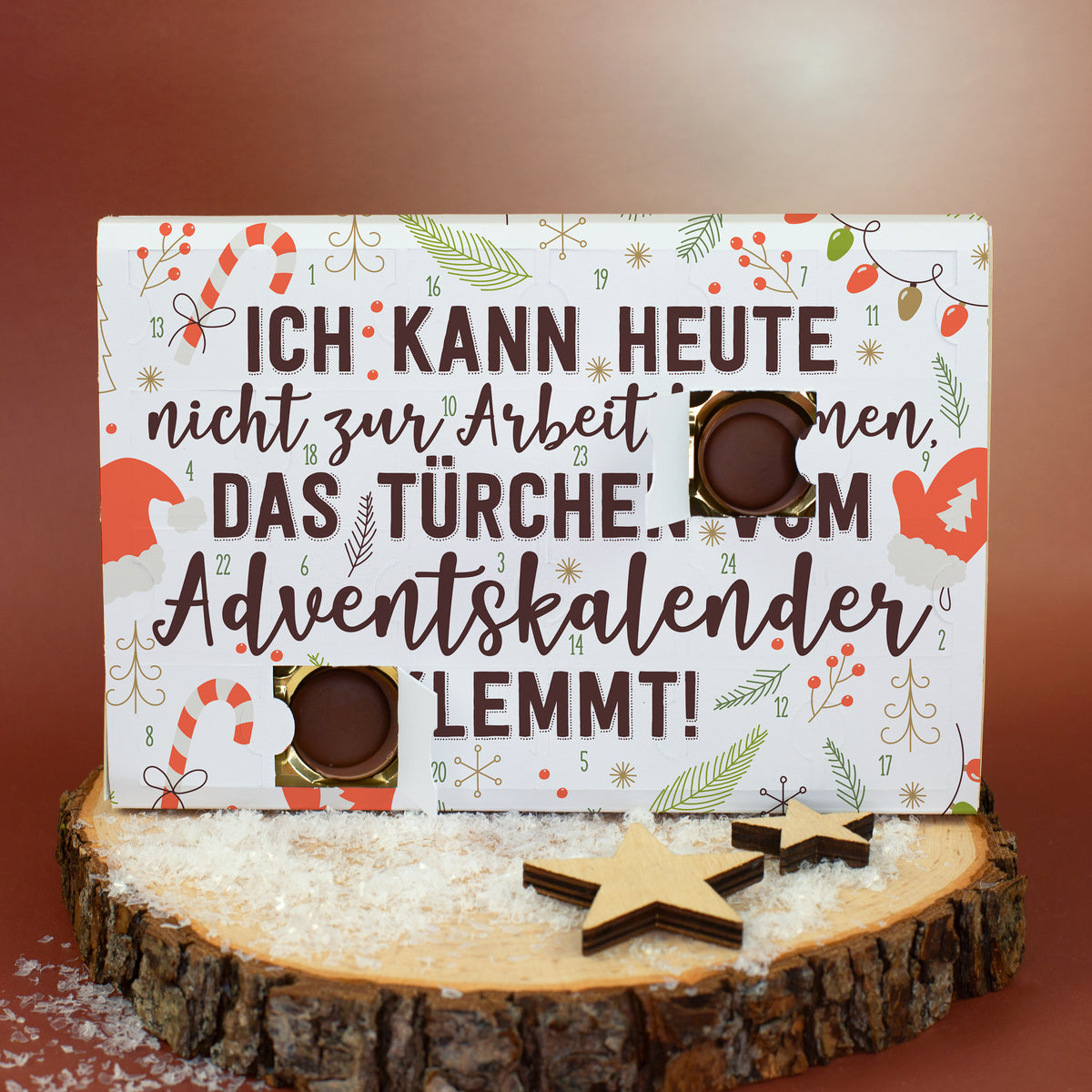 Geöffneter Toffifee Adventskalender mit humorvollem Weihnachtsmotiv