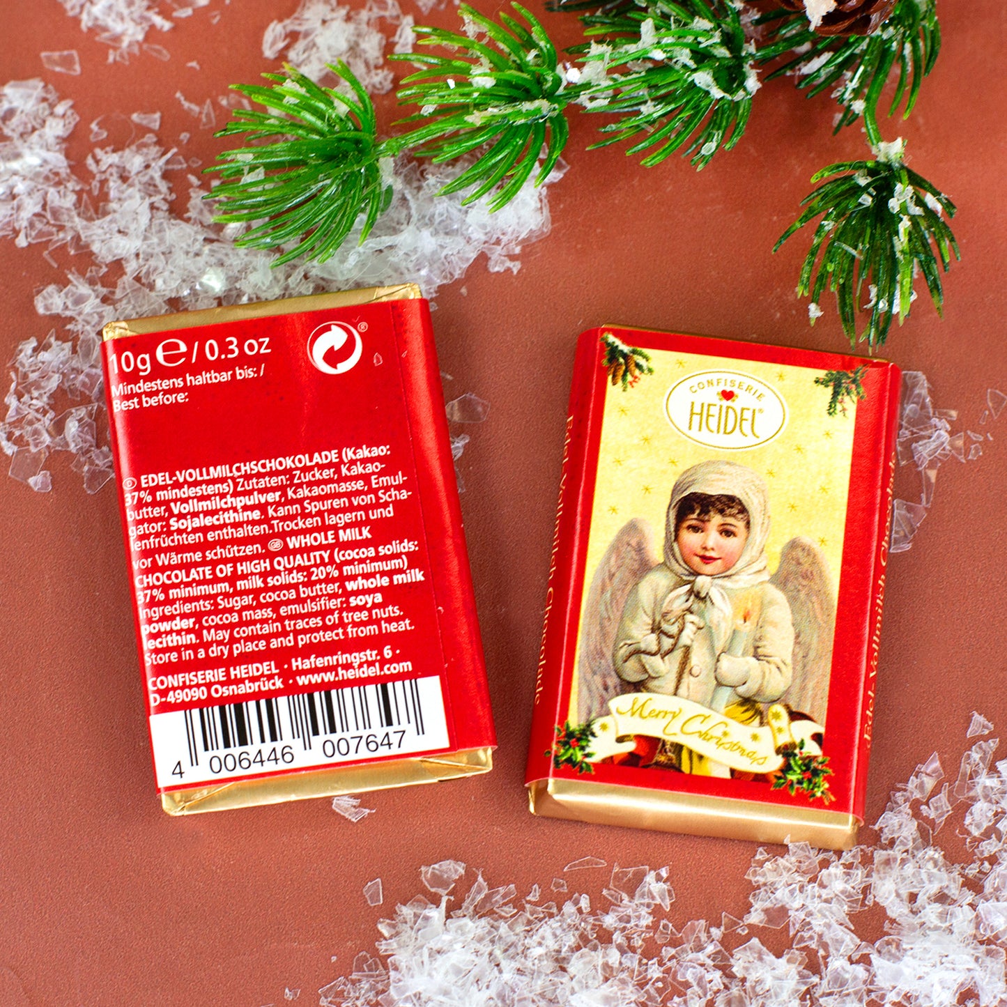 Heidel Edel-Vollmilchschokolade mit Weihnachtsmotiv sowie Zutaten und Produktangaben