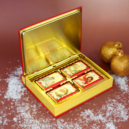 Geöffnete Metalldose in Buchform mit 8 Täfelchen Vollmilchschokolade von Heidel
