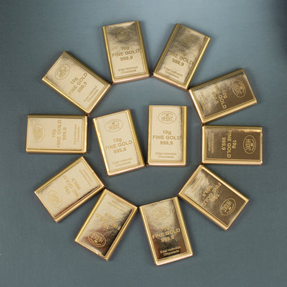 Zwölf Schokoladentafeln in goldfarbener Fine Gold 999,9 Verpackung