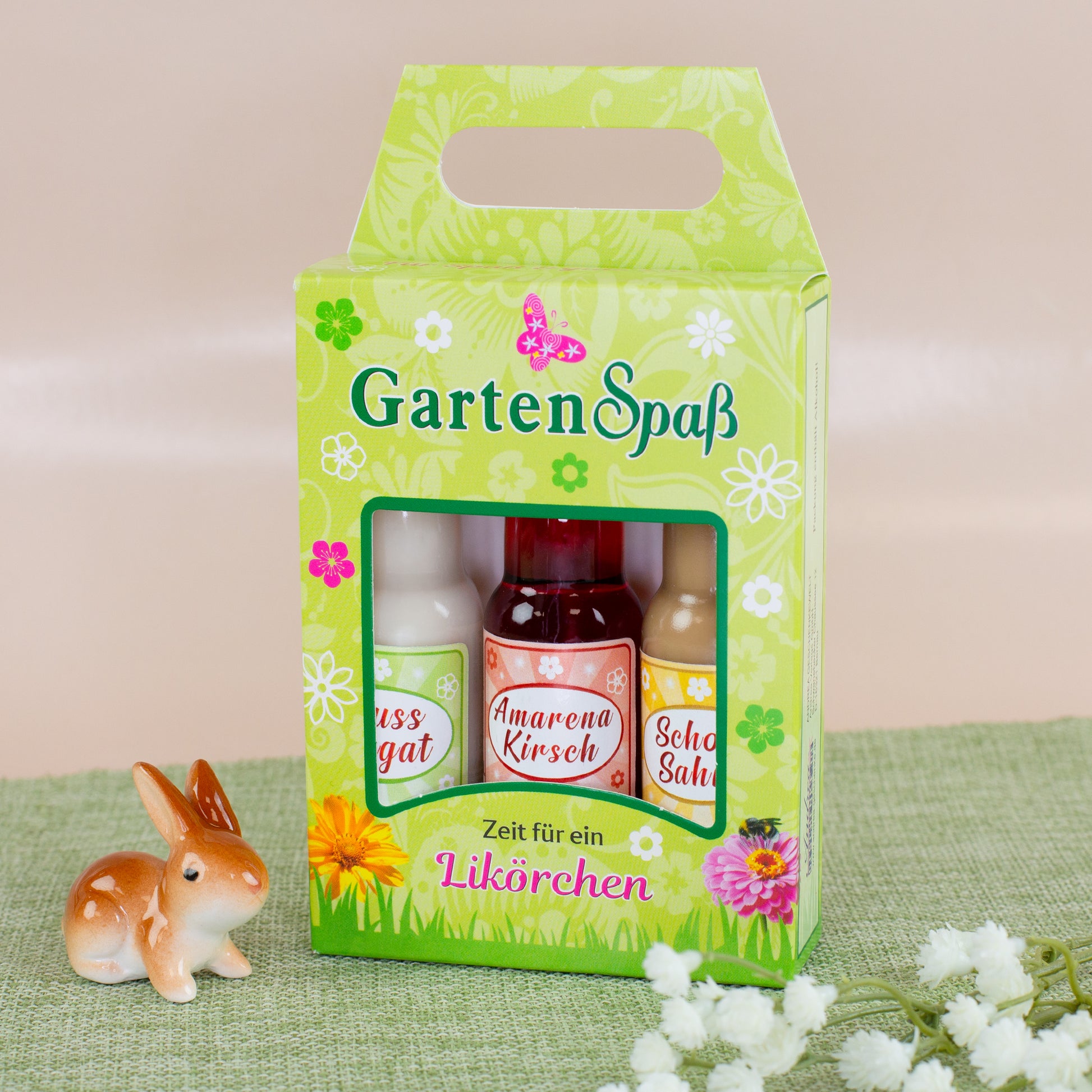 Geschenkset Likör „Gartenspaß“ dekoriert mit Osterhase und Frühlingsblumen