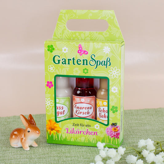 Geschenkset Likör „Gartenspaß“ dekoriert mit Osterhase und Frühlingsblumen