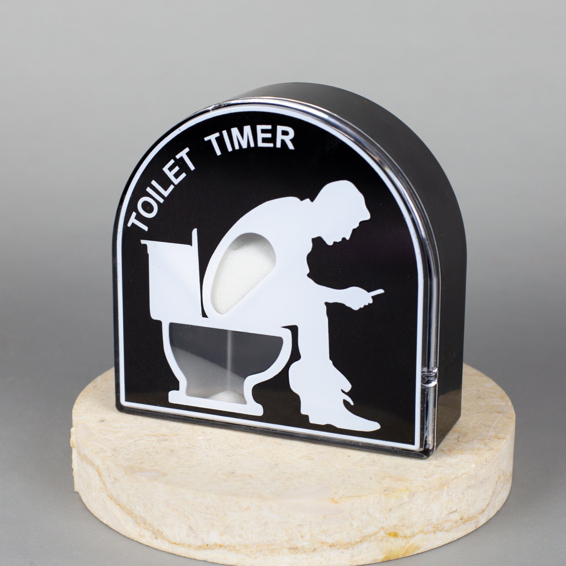 Toiletten-Timer aus Kunststoff auf dekorativem Sockel präsentiert