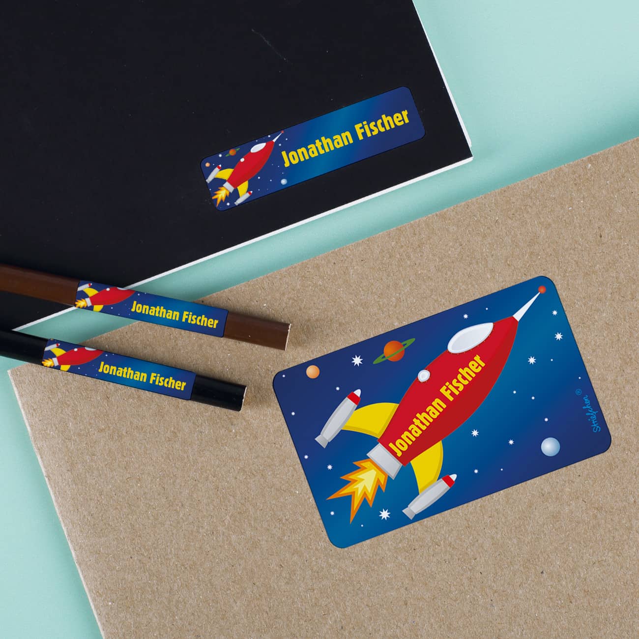 Namensaufkleber mit Rakete im Set