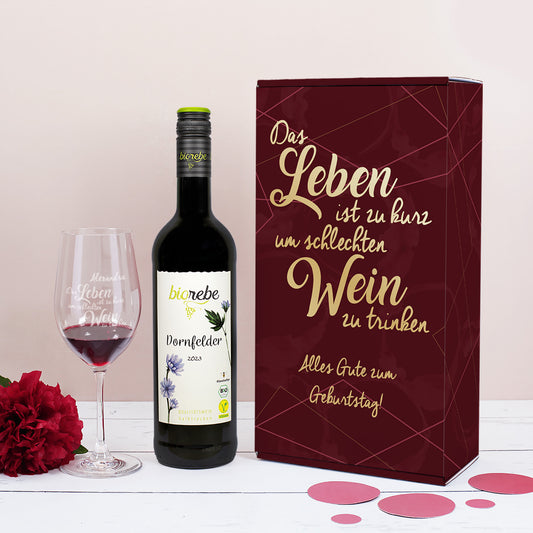 Geschenkset mit Biorebe Dornfelder, personalisiertem Weinglas und weinroter Geschenkbox mit dem Spruch „Das Leben ist zu kurz, um schlechten Wein zu trinken“
