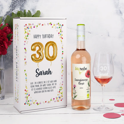 Geschenkset mit Biorebe Roséwein, personalisiertem Weinglas und Geschenkbox zum 30. Geburtstag mit goldenen Ballons