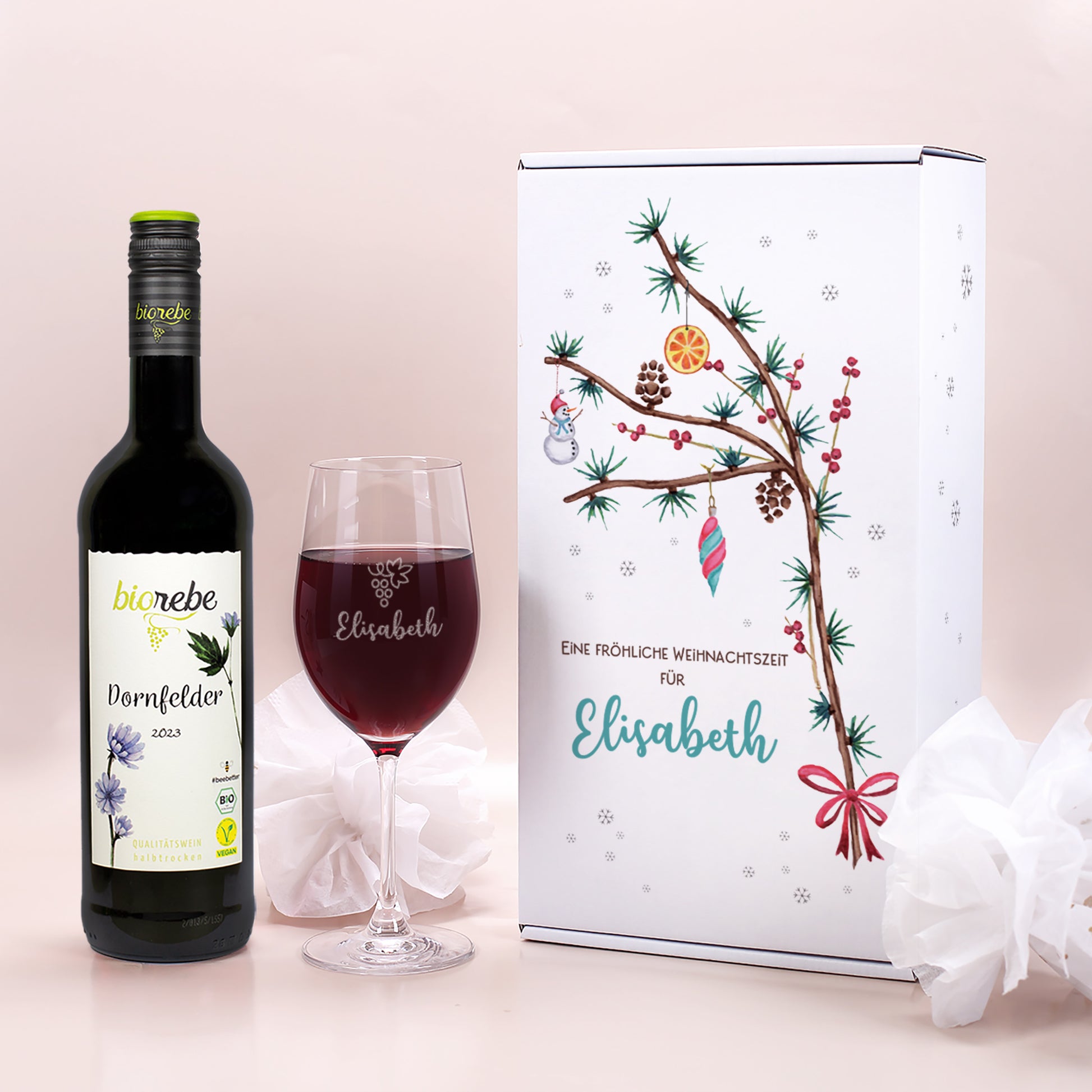 Geschenkset mit Biorebe Dornfelder Rotwein, graviertem Weinglas mit Name Elisabeth und weihnachtlicher Geschenkbox mit Tannenzweig