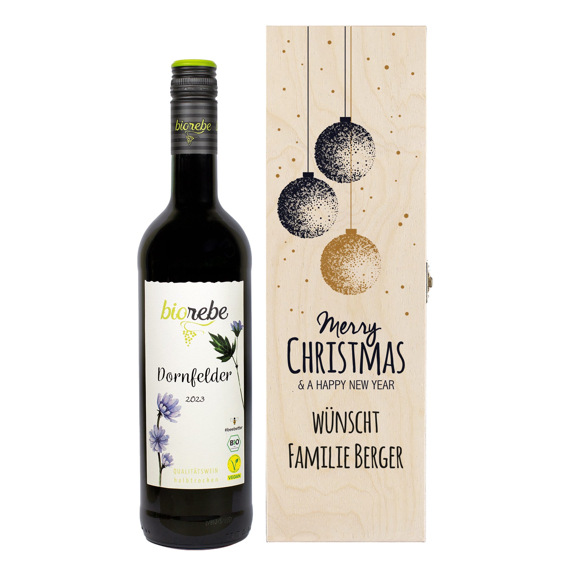 Geschenkset mit Biorebe Dornfelder Rotwein und gravierter Holzbox „Merry Christmas & a Happy New Year“, personalisiert mit „Familie Berger“.