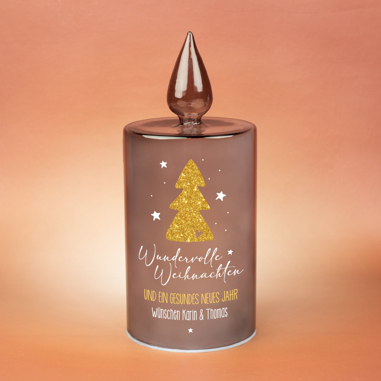 Graues Glaslicht von Leonardo mit warmem LED-Schein, goldenem Weihnachtsbaum und Weihnachtsaufschrift, personalisiert mit Wunschtext.