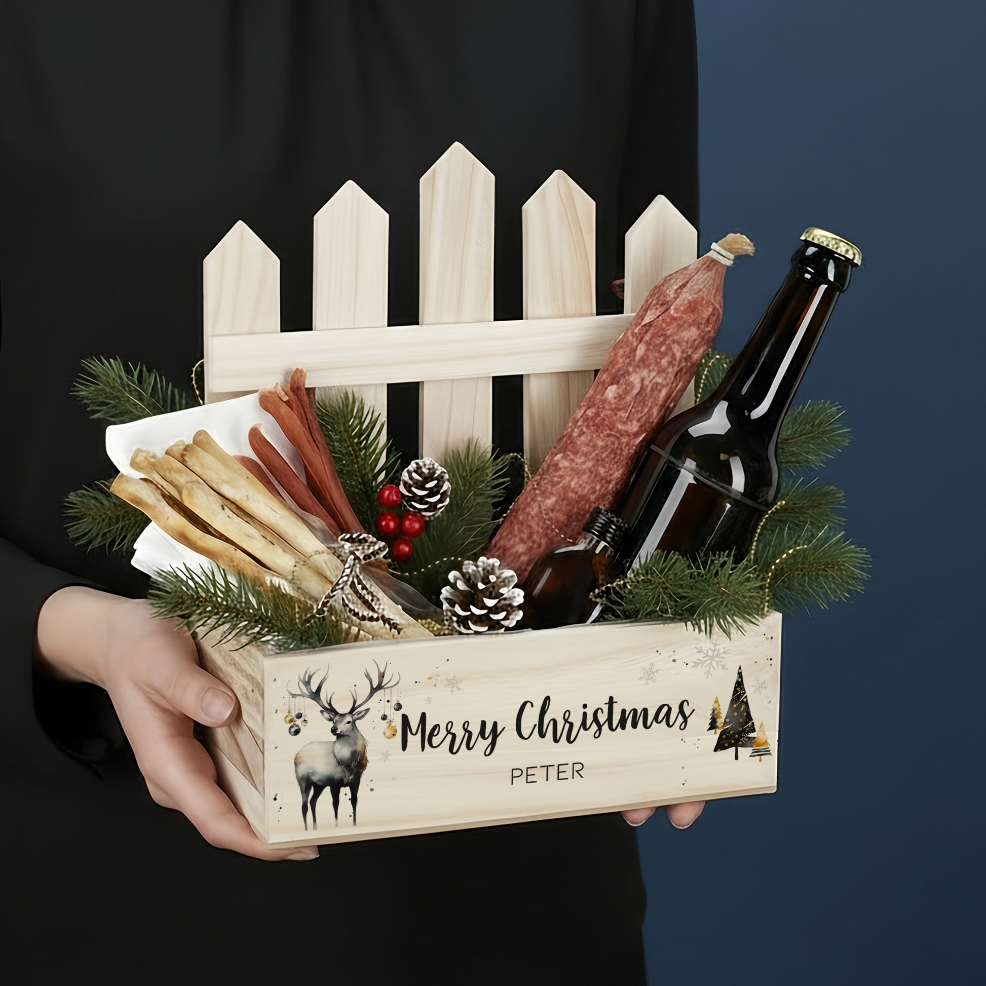 Geschenkkiste mit Zaun und Wunschtext zu Weihnachten