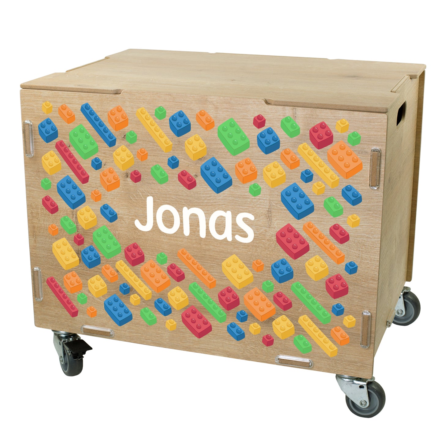Spielzeugkiste aus Holz mit Bausteinwelt-Motiv und Name, Seitenansicht mit Rollen und Deckel, robuste Verarbeitung erkennbar