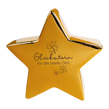 Keramikstern in Gold mit Glücksstern-Motiv und individueller Personalisierung, freigestelltes Produktfoto