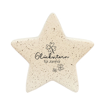 Freigestellter kleiner Glücksstern mit personalisiertem Text
