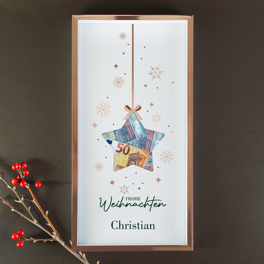 Personalisierter Bilderrahmen zu Weihnachten mit Name Christian, Sternmotiv und Geldscheinen in der Aussparung an dunkler Wand