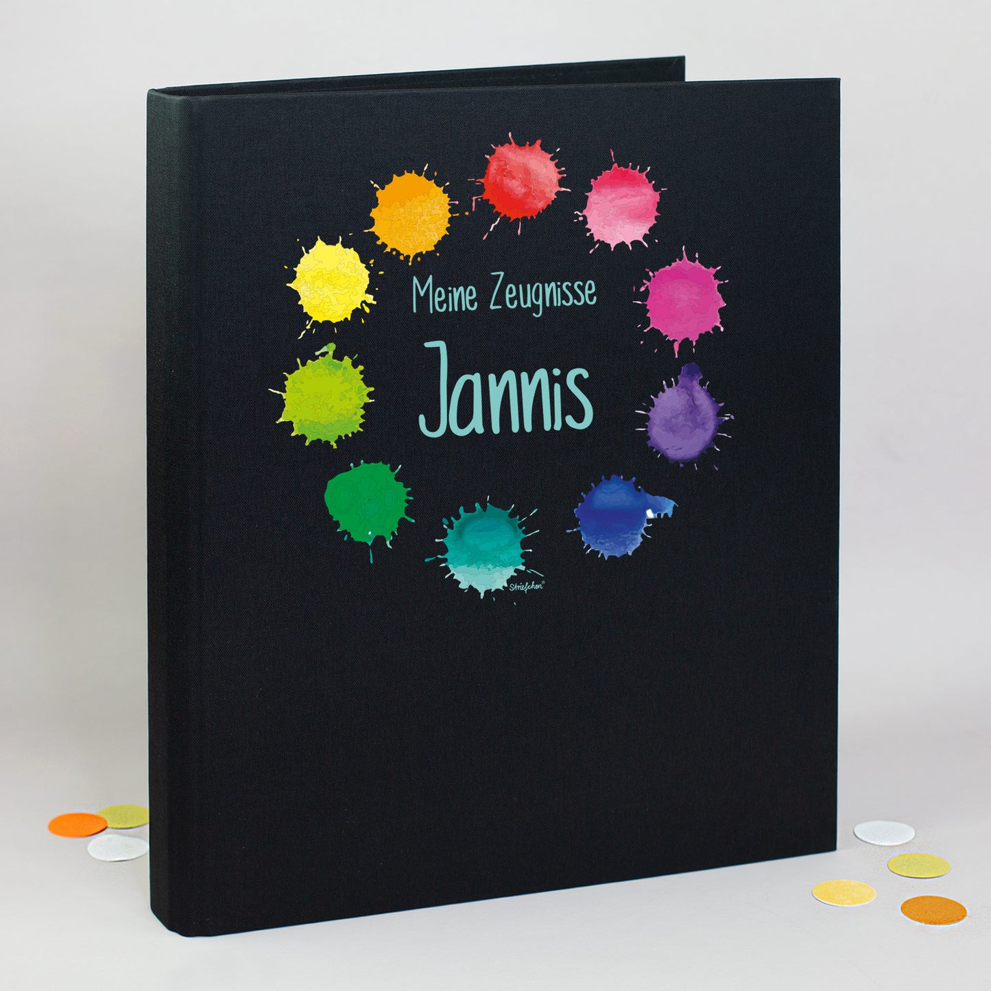 Zeugnismappe aus Leinen in Schwarz mit buntem Farbklekse-Motiv und Name Jannis bedruckt