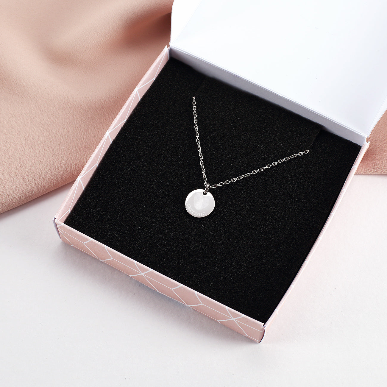 Leonardo Kette mit Herz aus Fingerabdrücken und Ihrem Wunschtext in Silber in Schmuckverpackung