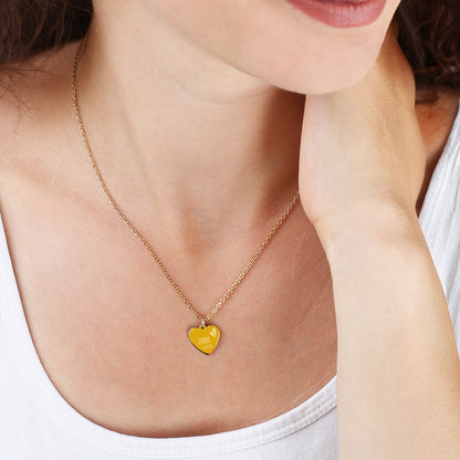 goldene Leonardo Herzkette zur Geburt mit Name und Datum des Babys graviert