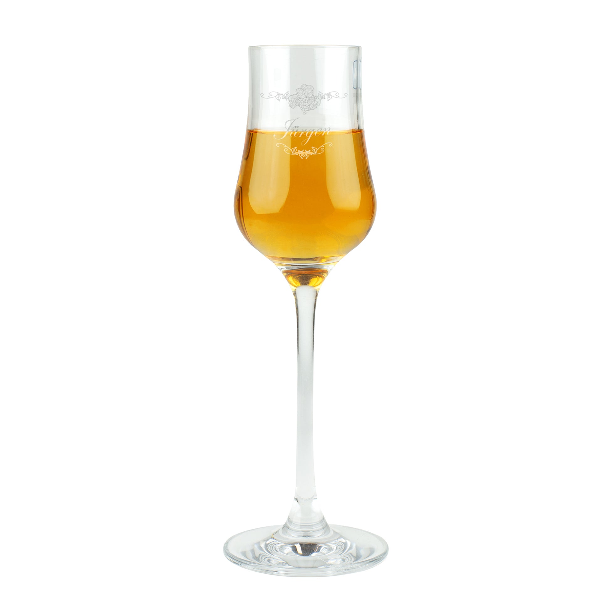 Freigestellte Aufnahme des Leonardo Grappaglases mit Gravur „Jürgen“ und goldenem Grappa.