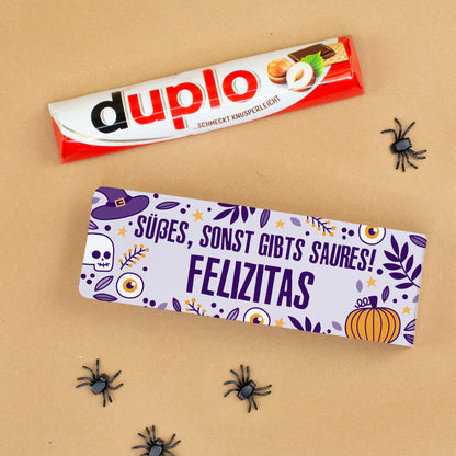 Personalisierte Halloween-Geschenkverpackung Felicitas mit duplo Riegel und Spinnen-Deko