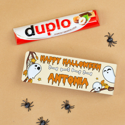 Duplo Riegel mit personalisierter Halloween-Verpackung Antonia, Geistermotiv und kleinen schwarzen Deko-Spinnen