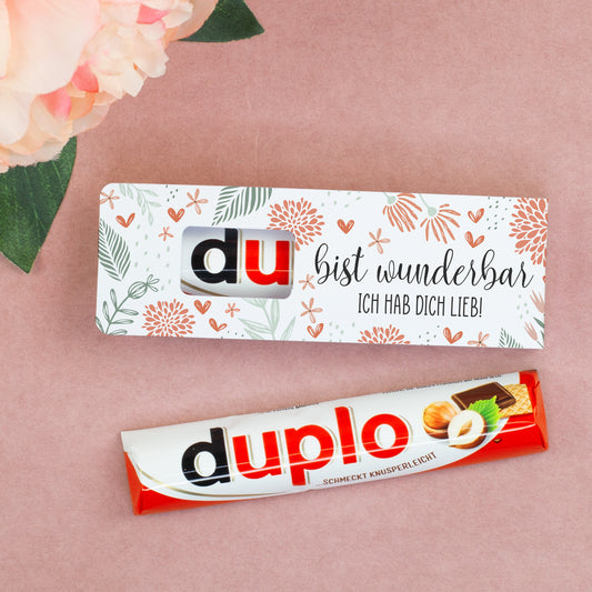 Geschenkverpackung mit Aufdruck Du bist wunderbar ich hab dich lieb auf rosa Hintergrund