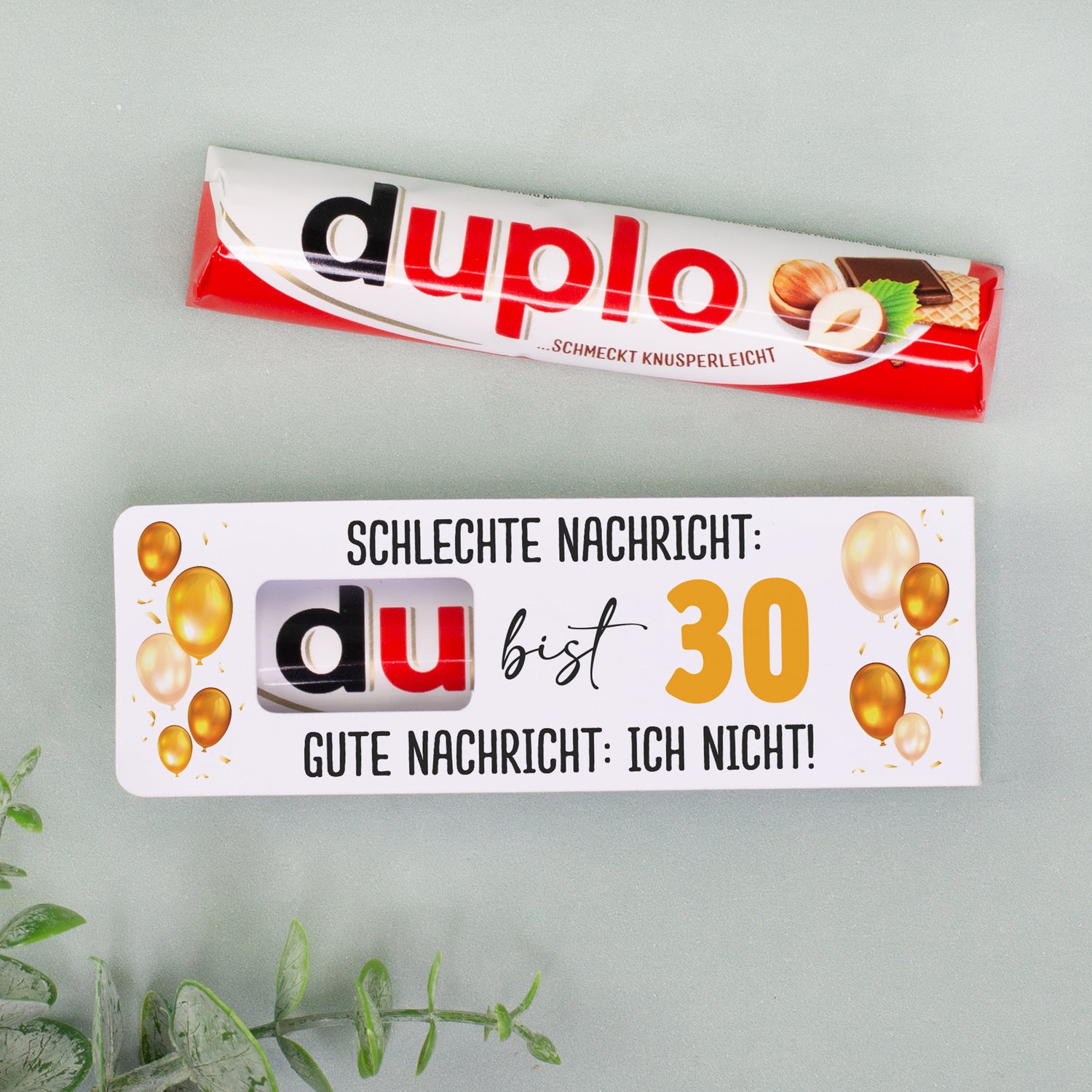 duplo Riegel und personalisierte Geburtstagsverpackung mit Ballonmotiv nebeneinander