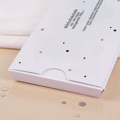 Rückseite der XXL Schokoladentafel mit Zutaten- und Nährwertangaben auf weißem Karton