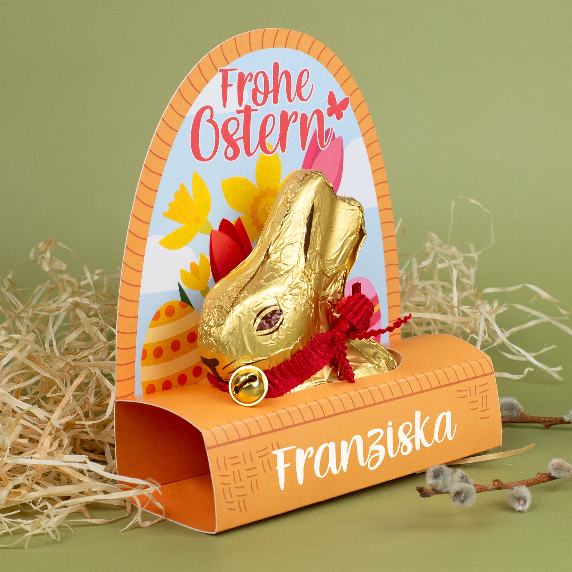 Lindt Goldhase 100 g in personalisierter Verpackung mit Name Franziska im Osternest
