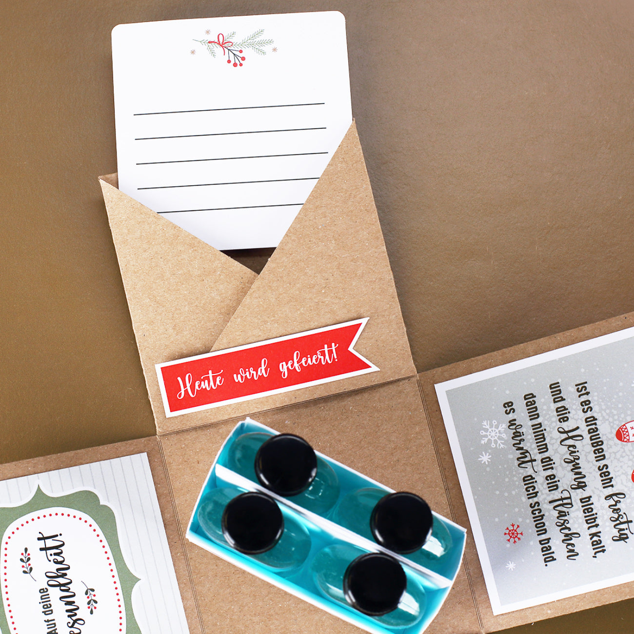 Wärmendes Wintergeschenk - Überraschungsbox mit Alkohol als Verpackung für Geld & Gutscheine