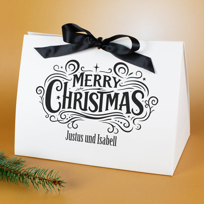 Große personalisierte Weihnachts-Geschenktasche mit „Merry Christmas“-Motiv, Namen „Justus und Isabell“ und Tannenzweig