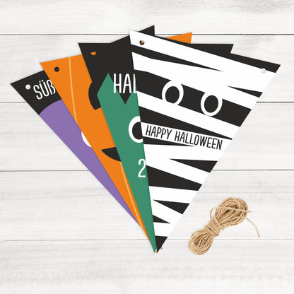 Halloween-Wimpel mit verschiedenen Motiven wie Kürbis, Mumie und Vampir, gestapelt mit Juteschnur daneben.