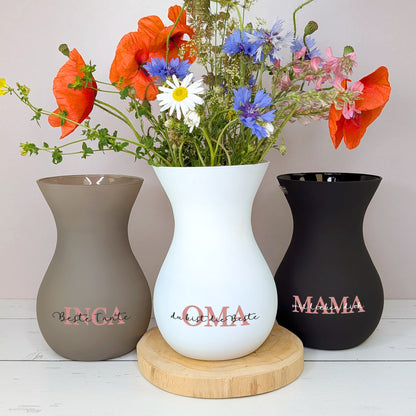 Bild der Vase in allen drei Farbvarianten mit Blumen in der weißen Variante