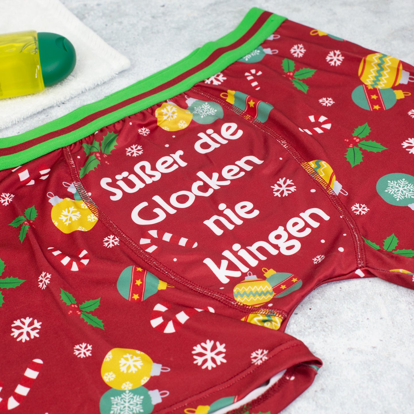 Detailaufnahme Vorderseite Weihnachts Boxershort mit Spruch Süßer die Glocken nie klingen