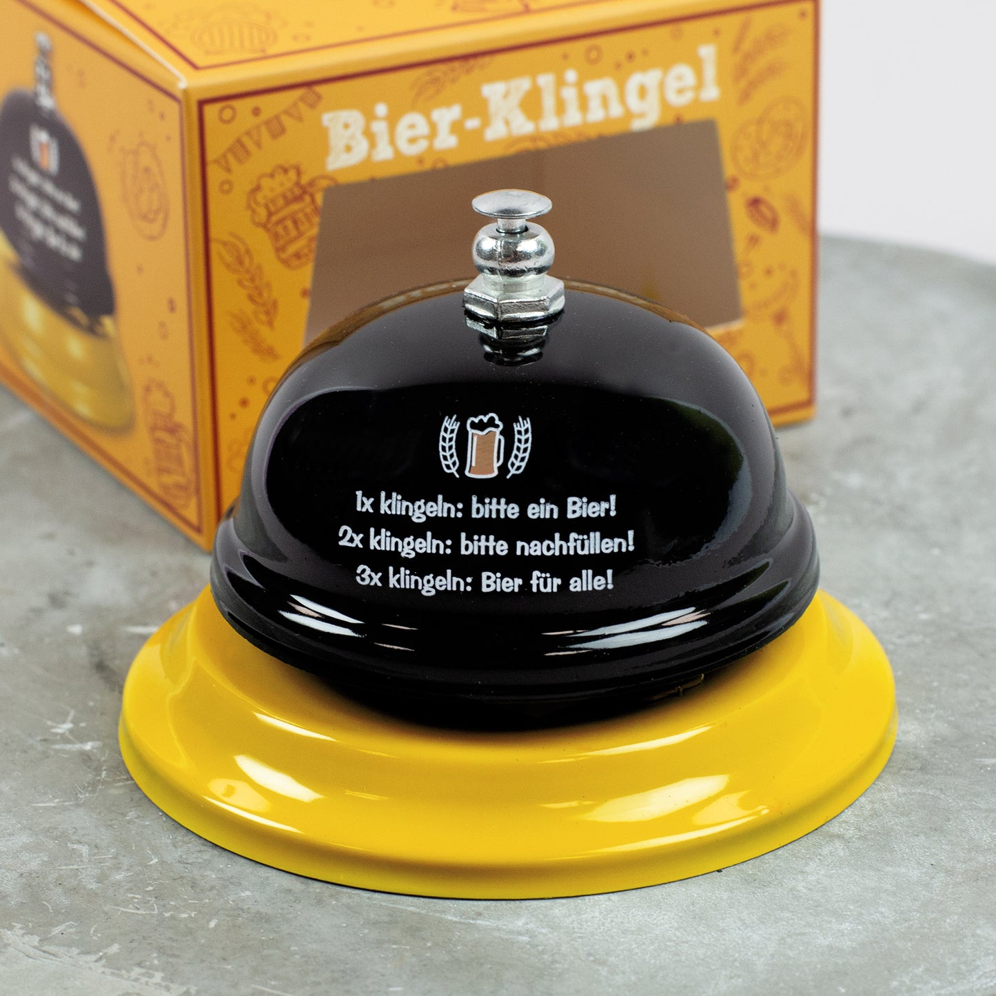 Bier-Klingel mit gelbem Sockel und schwarzer Glocke, witzige Geschenkidee für Bierfreunde